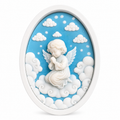 Cadre de cire parfumée Angelito Bakougie, ange blanc sur nuages bleus dans un intérieur doux